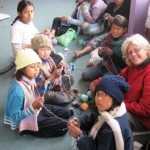 nafa-knitters-1 Vice President Brenda Hazelwood working with the PA Nepal children teaching
them Knitting skills